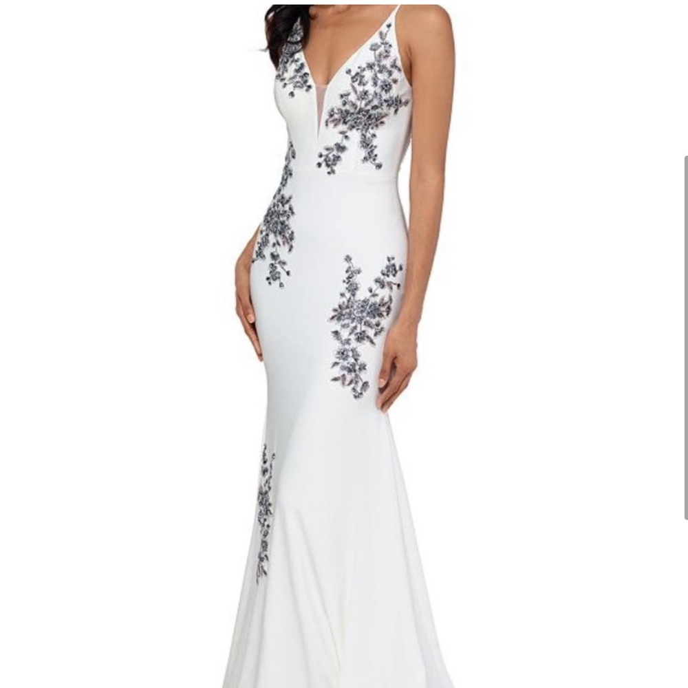 Xscape
skimming formal gown from Xscape.
Allover embellished floral embroidery